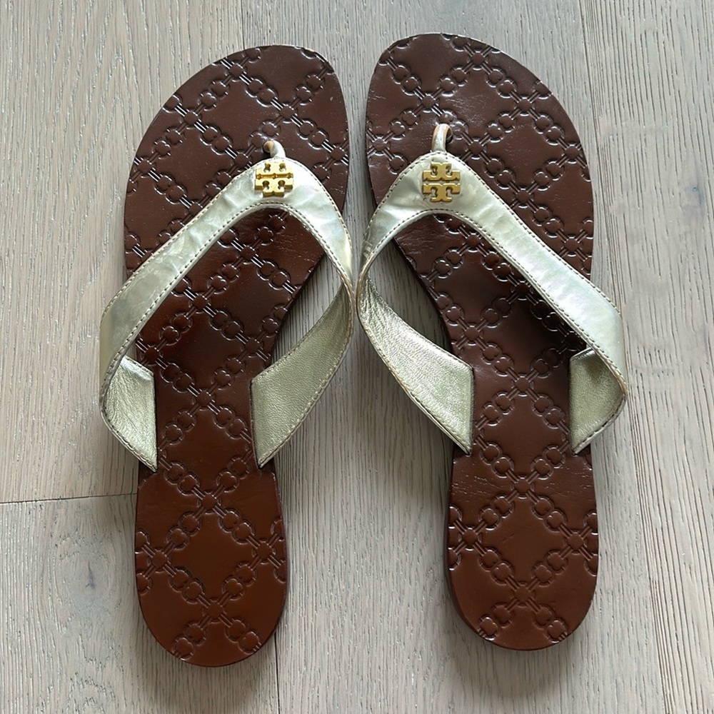 Tory Burch “Thora” Gold Leather Flip Flop Sandal
